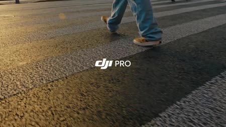 DJI  :Crossing the streets with wind under your feet? | Together with DJI RS4, ride a skateboard across the Bund of Shanghai